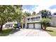 Charming two-story home featuring a balcony, a two-car garage, and well-maintained landscaping at 3157 Peartree Nw Dr, Acworth, GA 30101