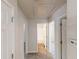A bright hallway features neutral carpet, and white doors leading to various rooms at 3157 Peartree Nw Dr, Acworth, GA 30101