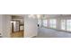 Open-concept living space with kitchen, dining area, and living room with fireplace at 3157 Peartree Nw Dr, Acworth, GA 30101