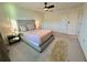 Comfortable bedroom with a soft carpet, neutral palette, and ample natural light at 544 Magnolia Circle, Palmetto, GA 30268