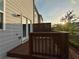 Wooden deck and a sunny, side exterior view of the house at 544 Magnolia Circle, Palmetto, GA 30268