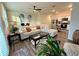 Open concept living area with a sofa, desk, and view into the kitchen and dining at 544 Magnolia Circle, Palmetto, GA 30268