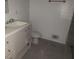Well-lit bathroom featuring a vanity with chrome hardware at 110 Chippewa Ct, Riverdale, GA 30296