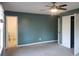 Bedroom with a ceiling fan, closet and access to a bathroom at 110 Chippewa Ct, Riverdale, GA 30296