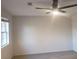 Bedroom with a ceiling fan and a window at 110 Chippewa Ct, Riverdale, GA 30296