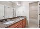 Bathroom with dual sinks, granite countertops and a tub/shower combination at 1549 Lake Holcomb Ln, Marietta, GA 30062