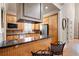 Well-appointed kitchen with granite counters, stainless steel appliances, and breakfast bar seating for casual dining at 1549 Lake Holcomb Ln, Marietta, GA 30062