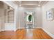 Spacious living room featuring hardwood floors and arched shelving at 1549 Lake Holcomb Ln, Marietta, GA 30062