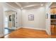 Bright living room with hardwood floors, neutral walls and white trim at 1549 Lake Holcomb Ln, Marietta, GA 30062