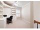 Office with built-in shelves, and a large window providing natural light at 1549 Lake Holcomb Ln, Marietta, GA 30062