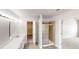 Bathroom featuring a shower stall, walk-in closet and a double vanity at 3001 Donamire Nw Ave, Kennesaw, GA 30144