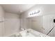 Bathroom features tub, sink, toilet, mirror, and door at 3001 Donamire Nw Ave, Kennesaw, GA 30144