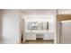 Modern bathroom with double vanity, ample lighting, and walk-in shower at 3001 Donamire Nw Ave, Kennesaw, GA 30144
