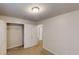 Bedroom with open closet with shelving and doorway to another bedroom at 3001 Donamire Nw Ave, Kennesaw, GA 30144