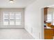 Bright dining area with large windows and decorative wall paneling at 3001 Donamire Nw Ave, Kennesaw, GA 30144