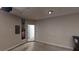 Two car garage with white doors and grey walls at 3001 Donamire Nw Ave, Kennesaw, GA 30144