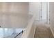Hallway featuring carpet flooring and access to rooms, providing seamless transition throughout the home at 3001 Donamire Nw Ave, Kennesaw, GA 30144