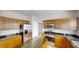 Features wooden cabinets, stainless steel appliances, and a granite countertop island at 3001 Donamire Nw Ave, Kennesaw, GA 30144