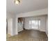 Spacious living room with staircase, bay window, and a kitchen at 3001 Donamire Nw Ave, Kennesaw, GA 30144