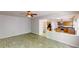 Living room next to the kitchen with tiled floor, ceiling fan, and fireplace at 3001 Donamire Nw Ave, Kennesaw, GA 30144