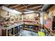 Organized basement workshop with pegboard walls, workbenches, and tool storage solutions at 6945 John Rivers Rd, Fairburn, GA 30213