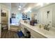 Bright and airy bathroom featuring double sinks, a soaking tub, and modern fixtures at 6945 John Rivers Rd, Fairburn, GA 30213