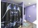 Unique bathroom design featuring a Darth Vader shower curtain and a blue accent rug at 6945 John Rivers Rd, Fairburn, GA 30213