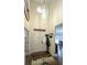 Welcoming entryway with high ceilings, decorative chandelier, and unique wall decor at 6945 John Rivers Rd, Fairburn, GA 30213