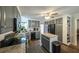 Well-appointed kitchen featuring granite counters, stylish cabinetry and stainless appliances at 6945 John Rivers Rd, Fairburn, GA 30213