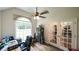 Office with a window and glass panel doors at 6945 John Rivers Rd, Fairburn, GA 30213