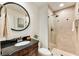 Modern bathroom with glass shower, elegant vanity, and stylish fixtures for a spa-like experience at 910 Kings Arms Way, Johns Creek, GA 30022