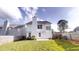 Two-story home with a well-manicured lawn and a small patio at 1001 Balsam Wood Trl, Villa Rica, GA 30180