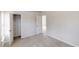Bedroom with carpet, three doors, and natural light at 1001 Balsam Wood Trl, Villa Rica, GA 30180