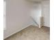 Bedroom with carpet flooring, white walls, and window with blinds at 1001 Balsam Wood Trl, Villa Rica, GA 30180