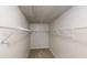 Walk-in closet with white walls and carpeted flooring and a single light at 1001 Balsam Wood Trl, Villa Rica, GA 30180