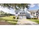 Charming two-story home featuring a two-car garage, neutral siding, and well-maintained landscaping at 1001 Balsam Wood Trl, Villa Rica, GA 30180