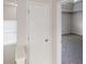 Hallway featuring bedroom entry and view of bedroom window at 1001 Balsam Wood Trl, Villa Rica, GA 30180