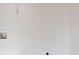 Empty white wall with electrical outlets and cable connection hookups at 1001 Balsam Wood Trl, Villa Rica, GA 30180