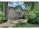 Charming home offers a private backyard with a spacious deck, perfect for entertaining at 1019 Wolf Springs Ct, Lawrenceville, GA 30043