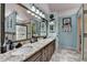 Bathroom features a double granite vanity and a separate tiled shower at 1019 Wolf Springs Ct, Lawrenceville, GA 30043