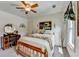 Charming bedroom featuring a bed, decor, and natural light at 1019 Wolf Springs Ct, Lawrenceville, GA 30043