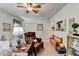 Charming bedroom featuring neutral walls, carpet flooring, and a cozy sitting area at 1019 Wolf Springs Ct, Lawrenceville, GA 30043