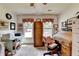 Inviting bedroom with a desk, natural light, and decorative accents at 1019 Wolf Springs Ct, Lawrenceville, GA 30043