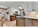 Kitchen includes modern appliances, granite countertops and updated cabinetry at 1019 Wolf Springs Ct, Lawrenceville, GA 30043