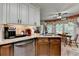 Kitchen featuring granite countertops, stainless steel appliances, and a breakfast nook with view outside at 1019 Wolf Springs Ct, Lawrenceville, GA 30043