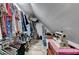 Spacious walk-in closet with ample storage and clothing racks at 1019 Wolf Springs Ct, Lawrenceville, GA 30043