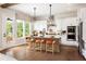 Modern kitchen with an island, pendant lights, stainless steel appliances, and views of the backyard at 1568 Wicker Wood Se Pl, Smyrna, GA 30080