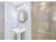 This light-filled bathroom features a walk-in shower and updated fixtures at 195 14Th St # 902, Atlanta, GA 30309