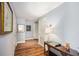 Entry Hallway with wood floors, neutral paint, a console table and decor at 195 14Th St # 902, Atlanta, GA 30309