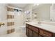 Clean bathroom with a shower-tub combo, updated vanity, and neutral color scheme at 3267 Standing Peachtree Trl, Kennesaw, GA 30152